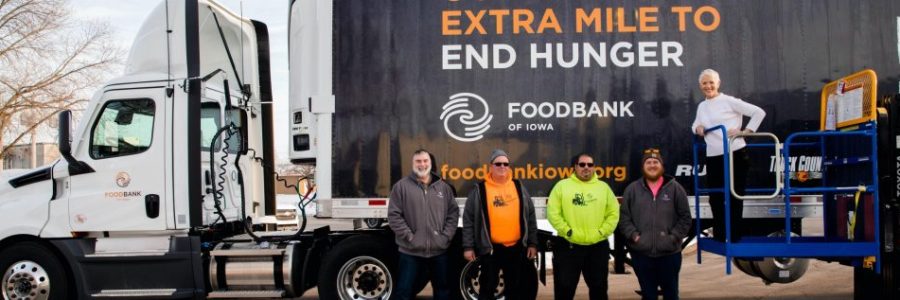 Food Bank Volunteers In Front Of Truck 1024x317 900x300 C Default 