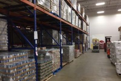 Tall racking with pallets of packaged food