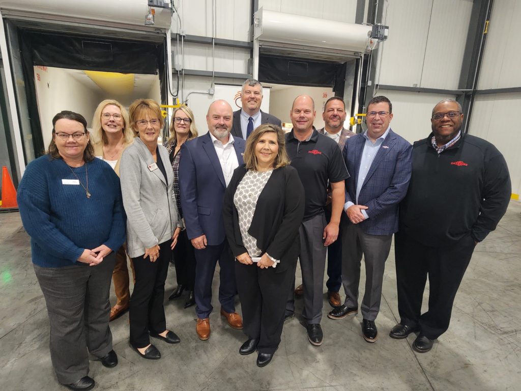 Iowa food bank association representatives welcome a generous donation of ground protein from Fareway and the Iowa Farm Bureau