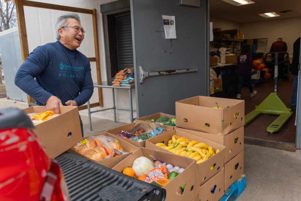 Man unloads food rescue at Catholic Charities in Des Moines on Feb. 7, 2024.