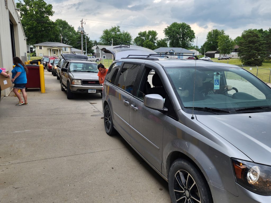 Cars lined up at mobile food distribution